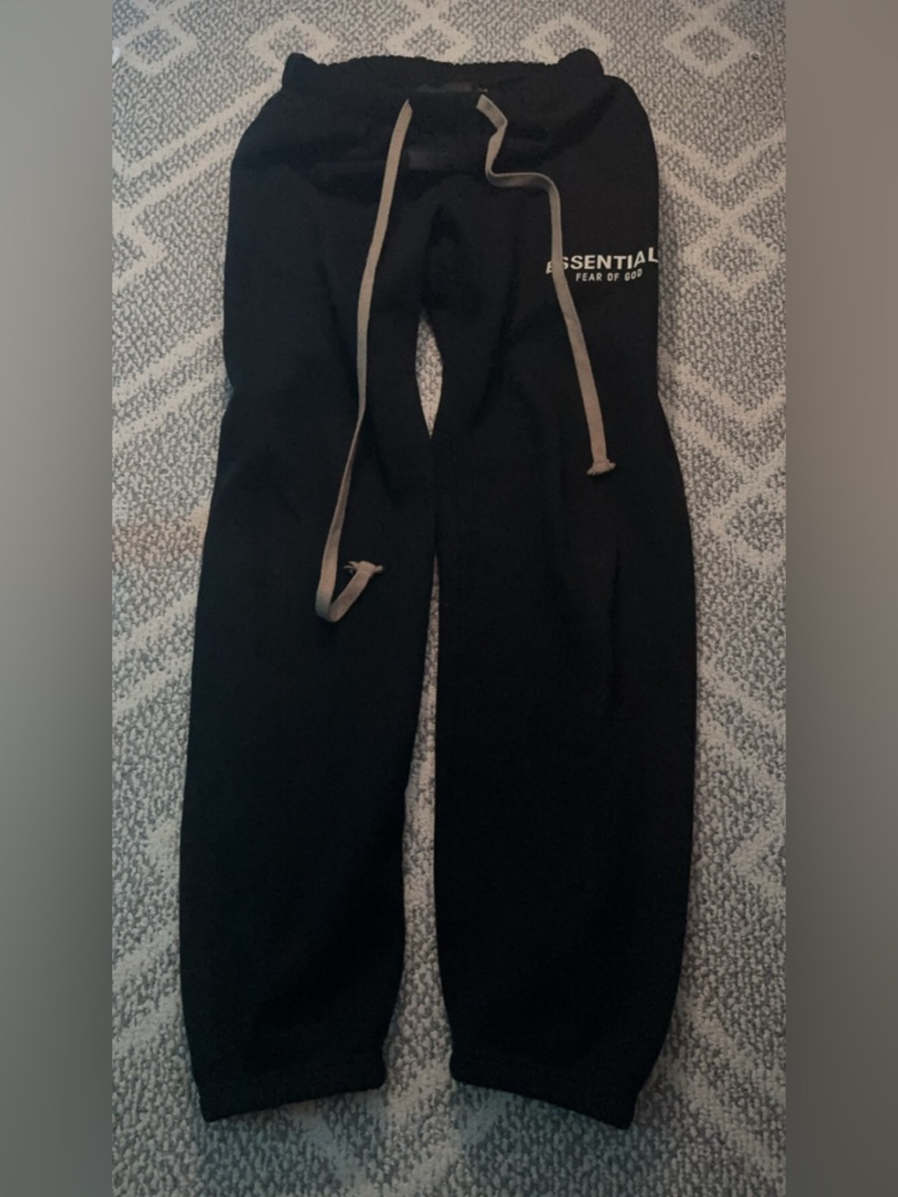 Fear of God ESSENTIALS Black Tee with White Vertical Logo